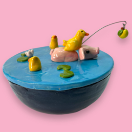 Koektrommel zwemmend varkentje