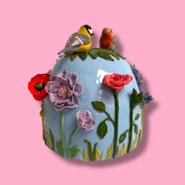 Urn met vogels en bloemen