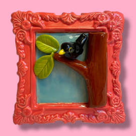 Schilderij van keramiek Merel