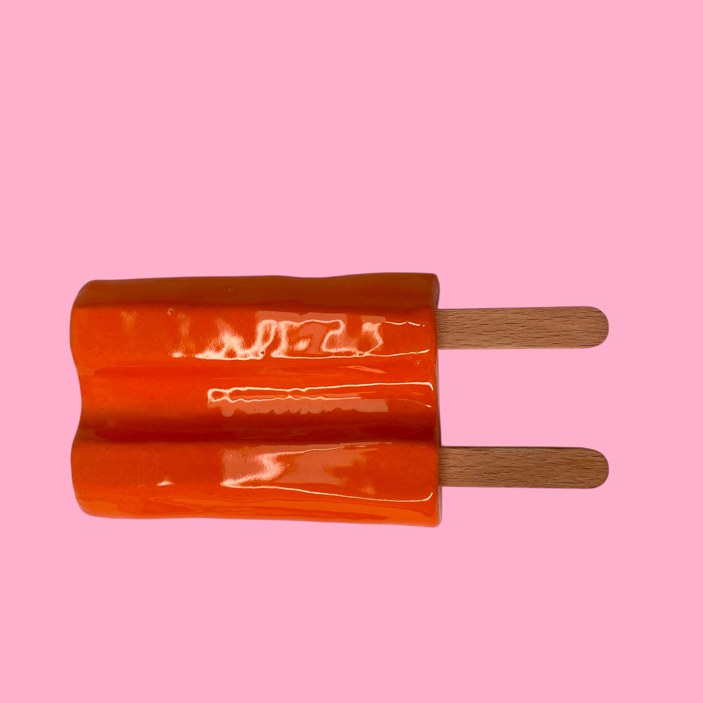 Dubbellikker van keramiek oranje