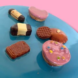 Koekjes koektrommel oranje gegolfd blauw deksel