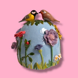 Urn met vogels en bloemen