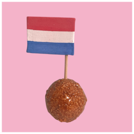 Bitterbal met vlaggetje van keramiek