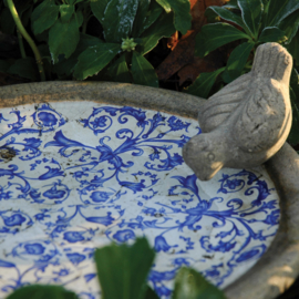 Aged ceramic bird bath