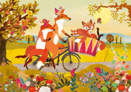 Vossenfamilie op de fiets