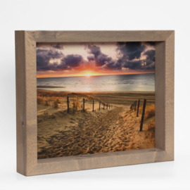 Strandafbeelding ( ondergaande zon ) met houten lijst