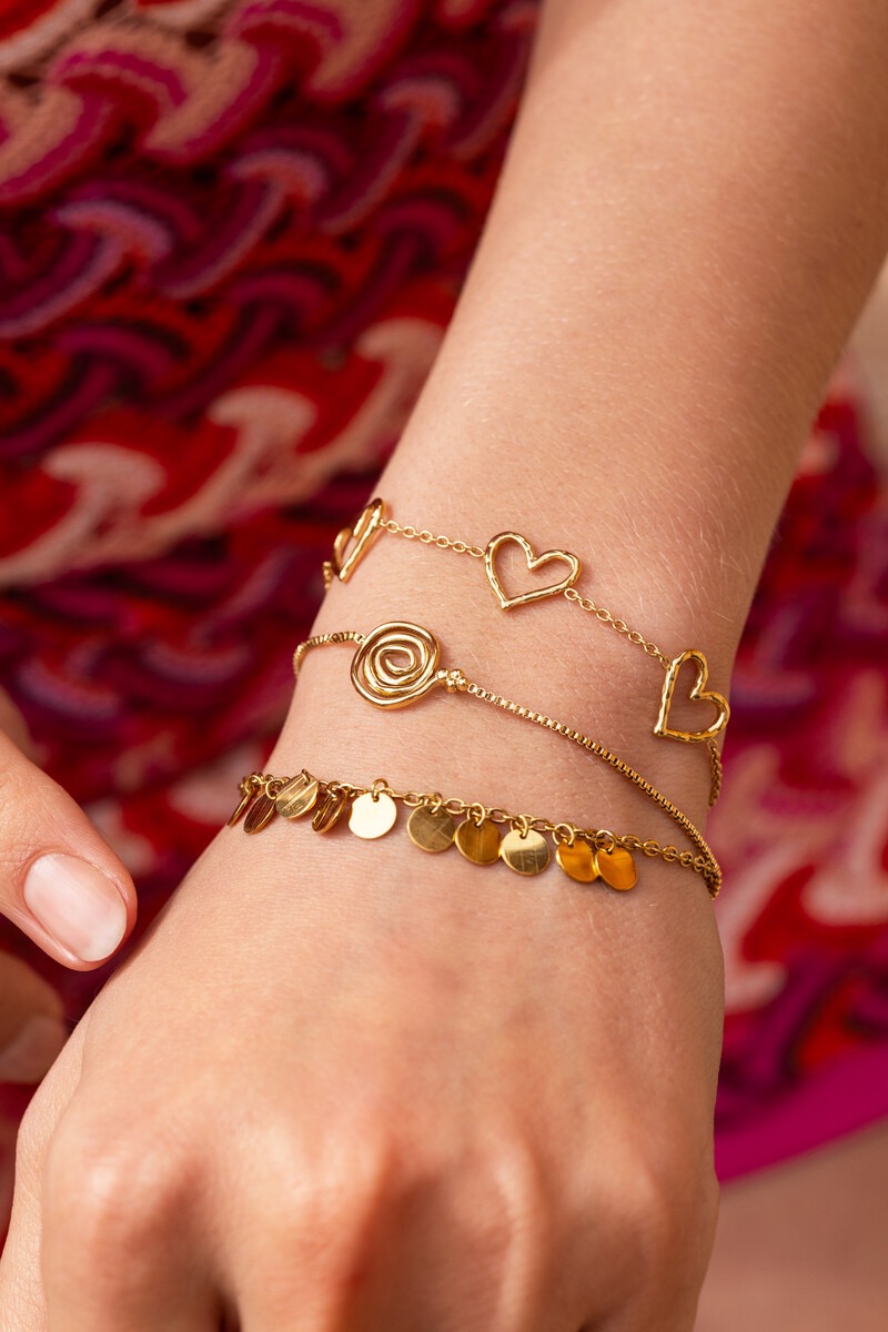 My jewellery Nomads armband met minimalistische swirl goud