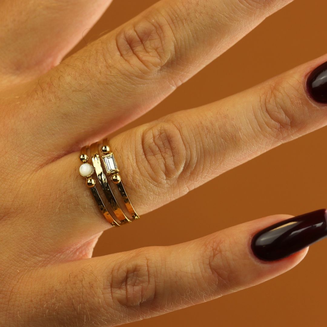 Camps & Camps triple ring with dubbel gems