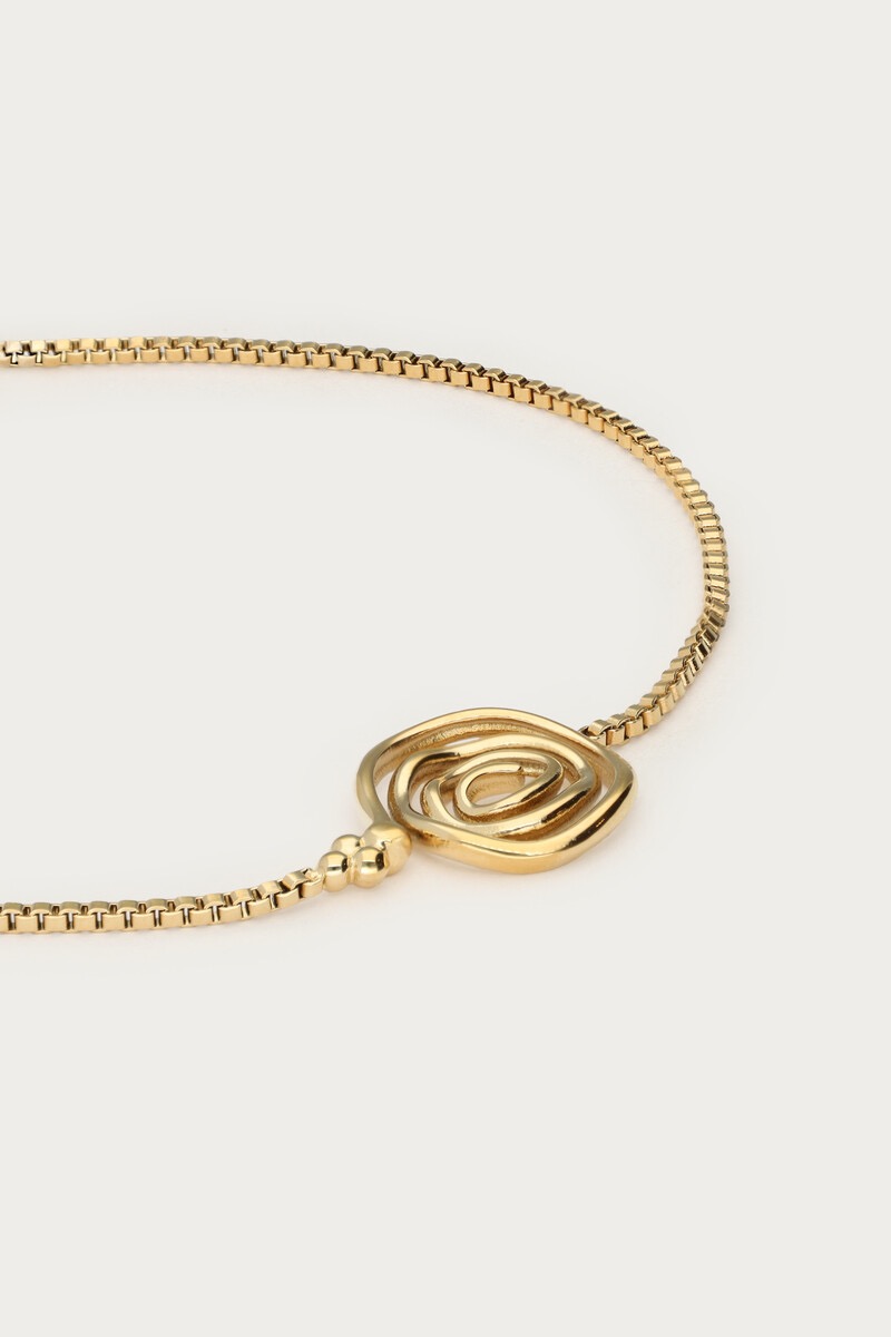 My jewellery Nomads armband met minimalistische swirl goud