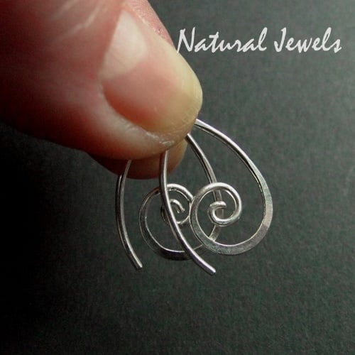 Tiny zilveren spiral oorbellen