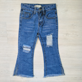 Distressing blue jeans