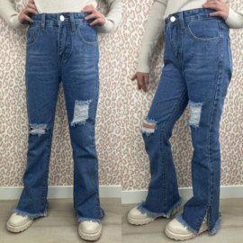 Distressing blue jeans