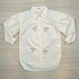 Your white ribbon blouse