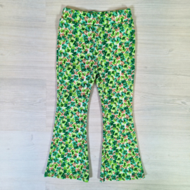 Flared pants - green small flowers