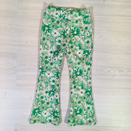 Flared pants - green/white flowers
