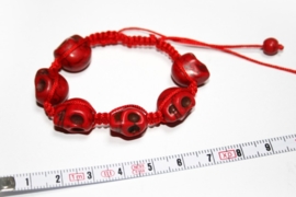 Red bracelet with Skullies