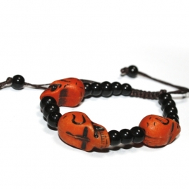 Black bracelet with Orange Skullies