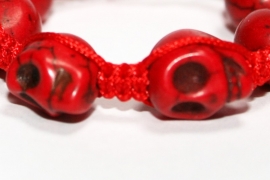 Red bracelet with Skullies