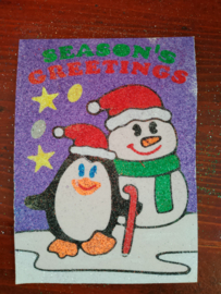 Kerst sneeuwpop en pinquin