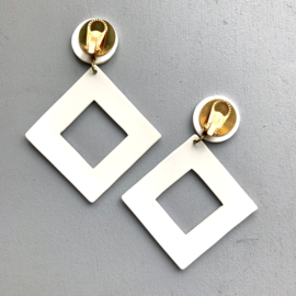 White Acrylic Clip Earrings With Gold Detail