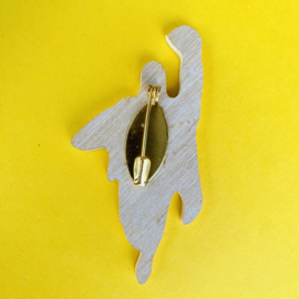 Superman brooch
