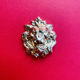 Lion gold tone brooch