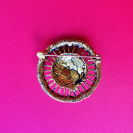 Gold lion with gemstones brooch