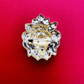 Lion gold tone brooch