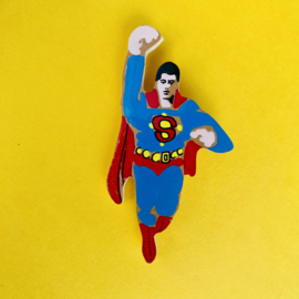 Superman brooch