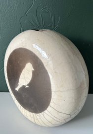 Raku vaas rond met vogel