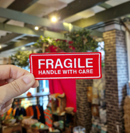Fragile embleem