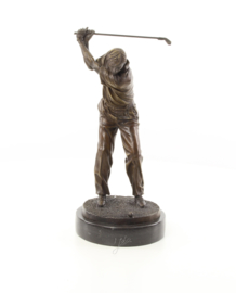 bronzen beeld van een golfer