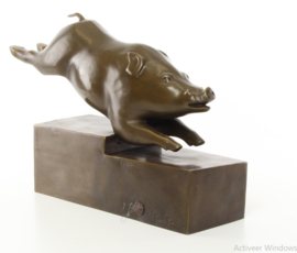 Een bronzen art deco bronzen beeld van een varken