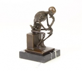 Bronzen skelet denker naar Rodin