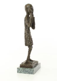 Een bronzen beeld van de schreeuw