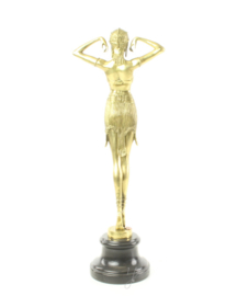 Een gepolijste bronzen beeld van de scarabee danser