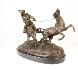 Bronzen beeld van een paardentemmer