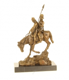 EEN BRONZEN SCULPTUUR GENAAMD "BERGAFWAARTS RIDE"