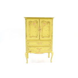 Hand-painted sanded yellow cabinet