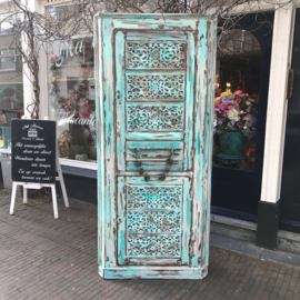 Turquoise corner cabinet