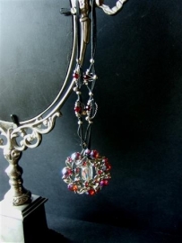 036 Necklace with vintage  ornament,  red cristals and nice decoration 