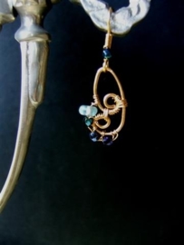 271 Aquamarijn   edelsteen  en verguld "wire wrapping"