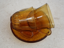 Set kop en schotels glas amberkleur