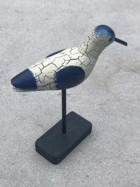 Vogel op voet blauw-wit snip