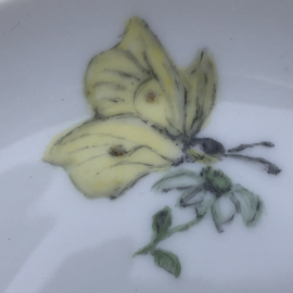 Klein vintage bordje vlinder-bloem