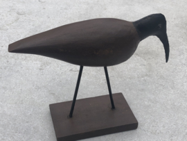 Vogel hout en metaal op voet