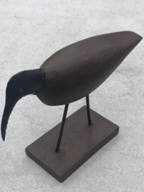 Vogel hout en metaal op voet