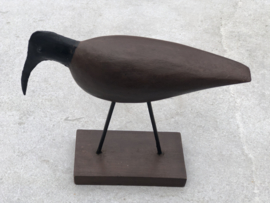 Vogel hout en metaal op voet