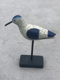 Vogel op voet blauw-wit snip
