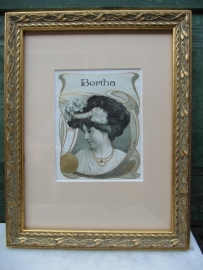 Antique gold frame with old image